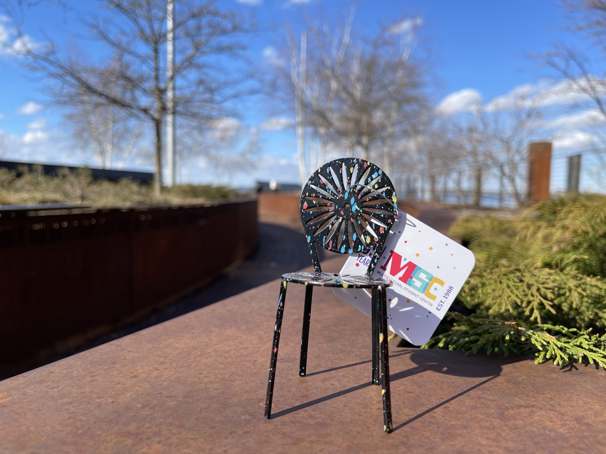 photo of a mini msc terrace chair with a blue sky background