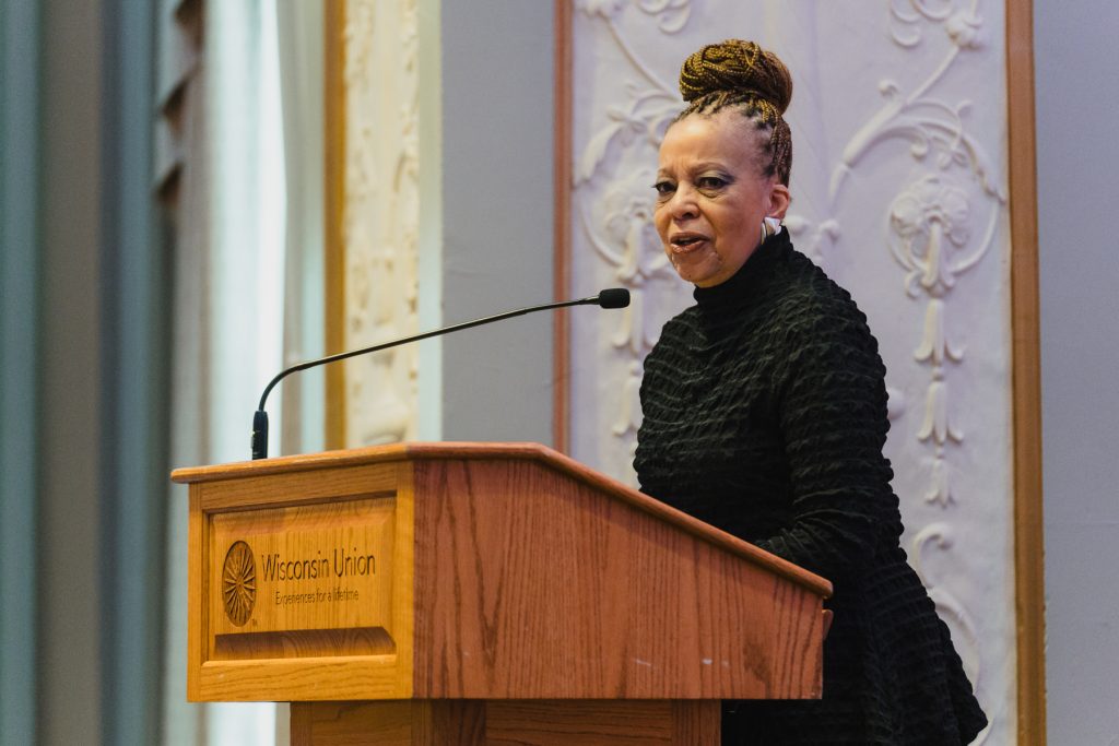 Dr. Candace McDowell at a podium.