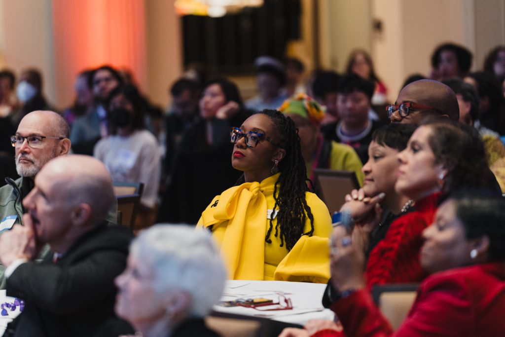 Attendees listening to the event.